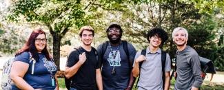 Group of students smiling at camera